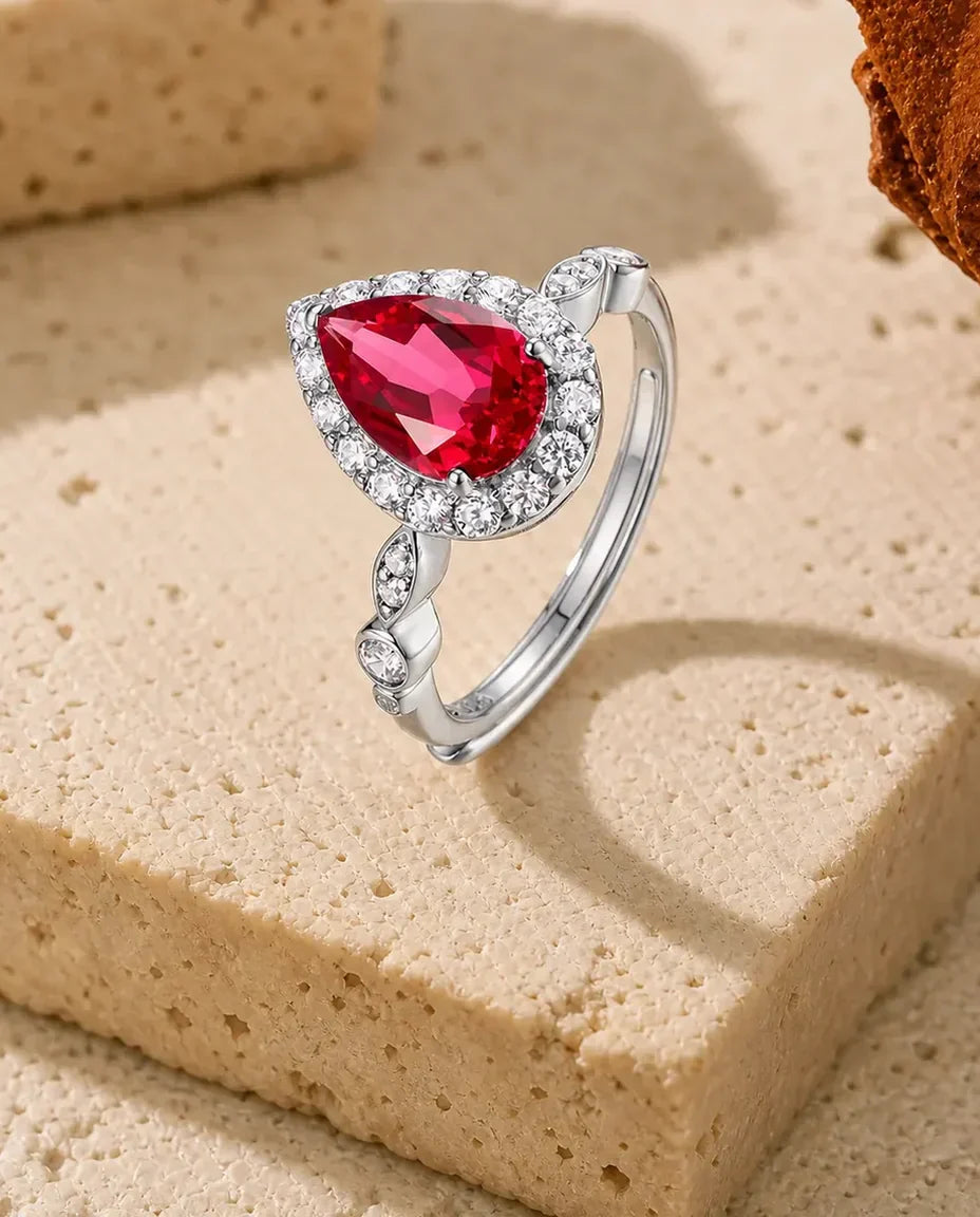 Rubin Ring – Halo-Ring mit Labor-Rubin im Tropfenschliff, größenverstellbar, 925er Sterlingsilber, Ring für Damen