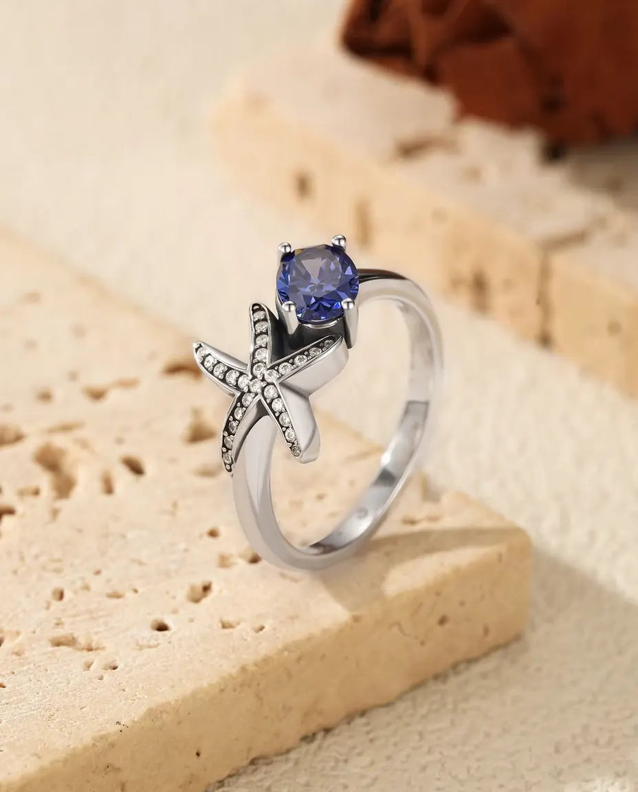 Seestern Ring - ovaler violetter Zirkonia 5 x 7 mm mit Pavé Stern, Größen 5 bis 9, 925 Sterlingsilber