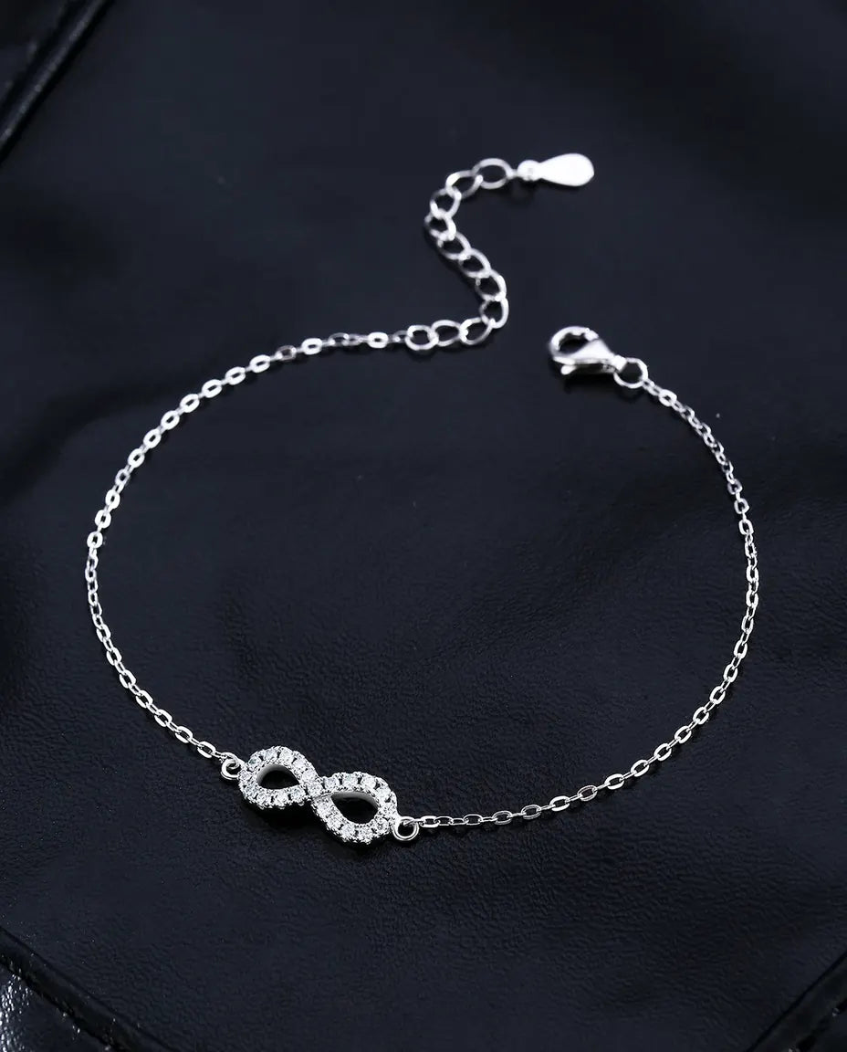 Moissanit Armband mit Unendlichkeitszeichen – 21 Steine in Farbe D an einer Gliederkette aus 925 Sterlingsilber