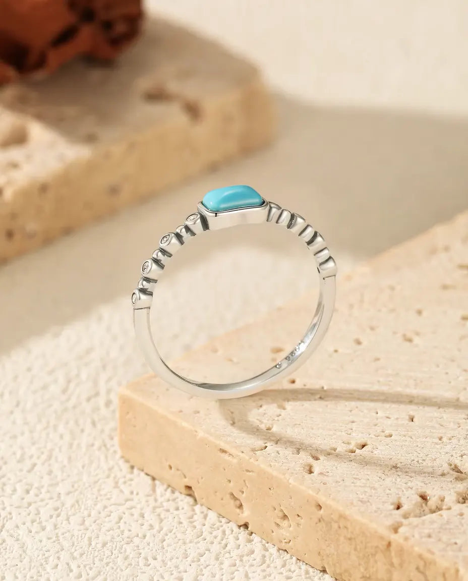 Türkis Ring - rechteckiger Cabochon auf Perlband mit Zirkonia, Größen 5 bis 9, 925 Sterlingsilber
